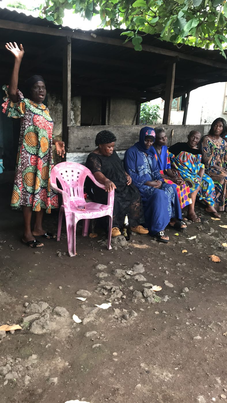 A moment of praise and thanksgiving during an outreach